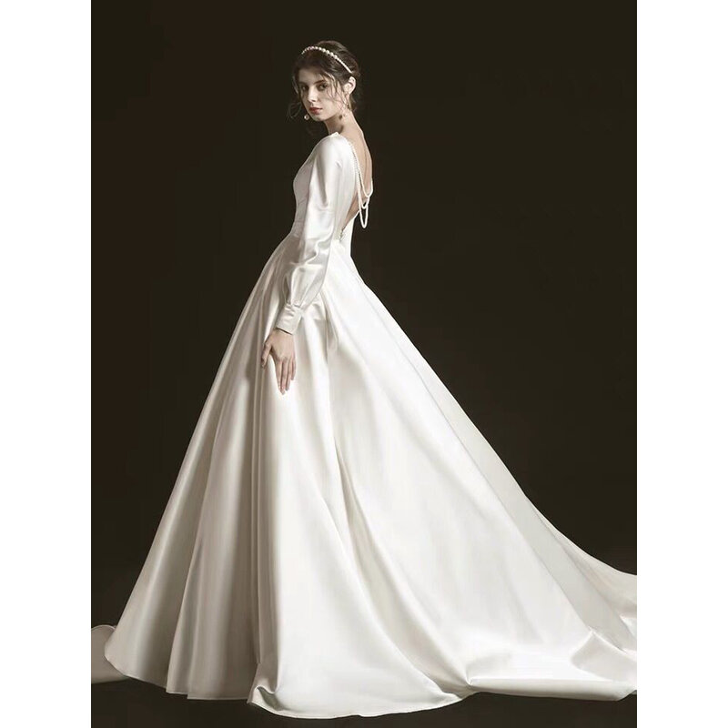 Gaun pengantin wanita, vestidos de novia de satin elegan Backless mutiara gaun pernikahan lengan Penuh buatan khusus