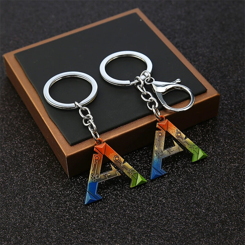 Spiel Arche Überleben entwickelt Schlüssel bund Brief ein Logo Metall Anhänger Schlüssel ring für Männer Frauen Llave ros Auto tasche Schlüssel halter Chaveiro Geschenke