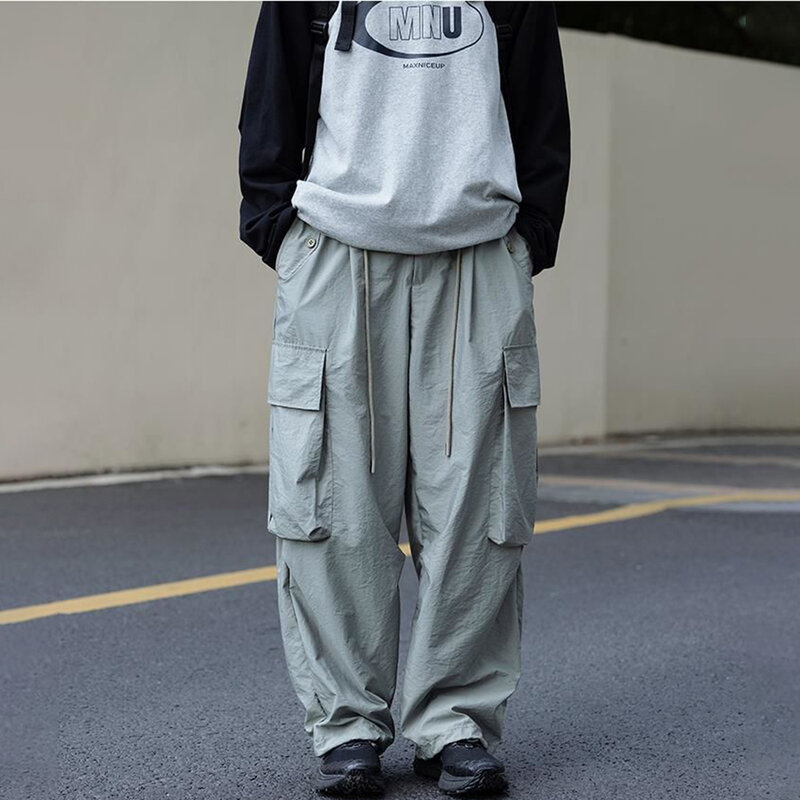 Letnie spodnie typu oversize Cargo męskie modny, z kieszeniami Casual spodnie męskie japońska moda uliczna luźne spodnie Hip Hop proste spodnie męskie