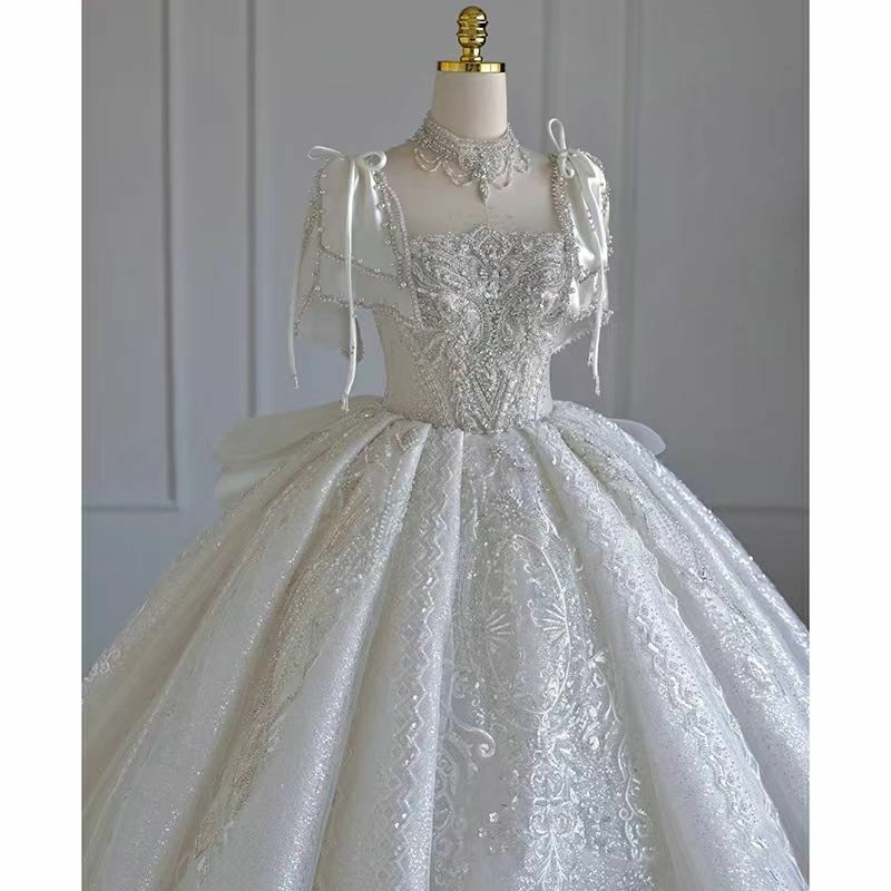 Dubaj Arabia suknia ślubna suknia ślubna luksusowa kryształowa suknia ślubna cekiny perły na szyję krótkie rękawy kościół Robe De Mariée