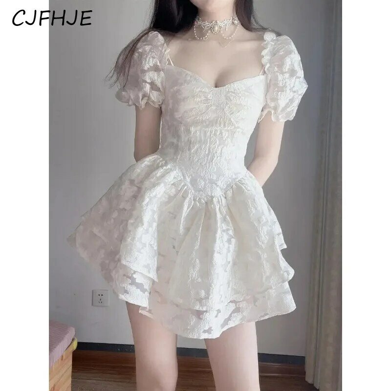 CJFHJE Women Summer Vintage Ruffle Sweet Chic Elegant Sexy Club Mini Dress White Short Sleeve Slim Fairy Party Princess Dress