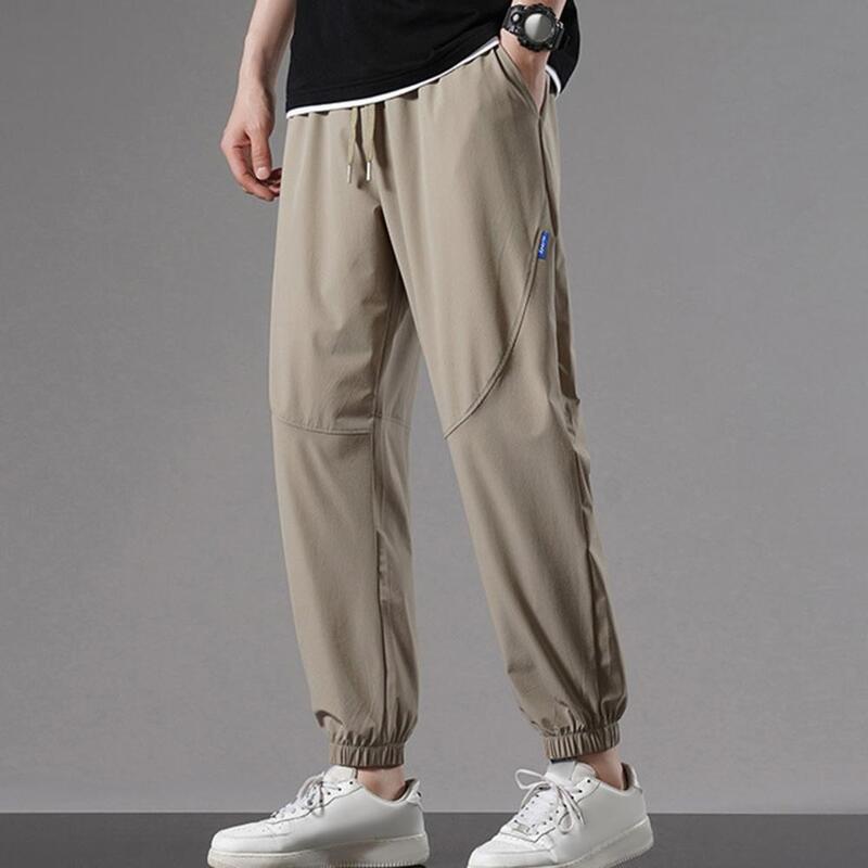 Calça de cintura elástica masculina, calça atlética, secagem rápida, calça esportiva com bolsos laterais, cordão para jogging