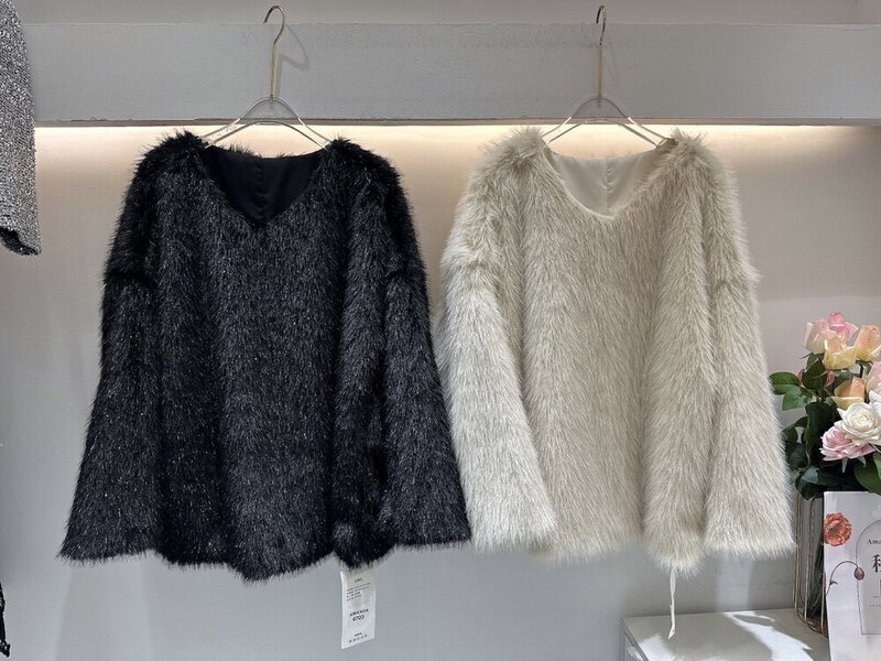 Suéter de piel sintética para mujer, Jersey grueso y cálido con cuello en V, suave y holgado, de Color liso, elegante, para Otoño e Invierno