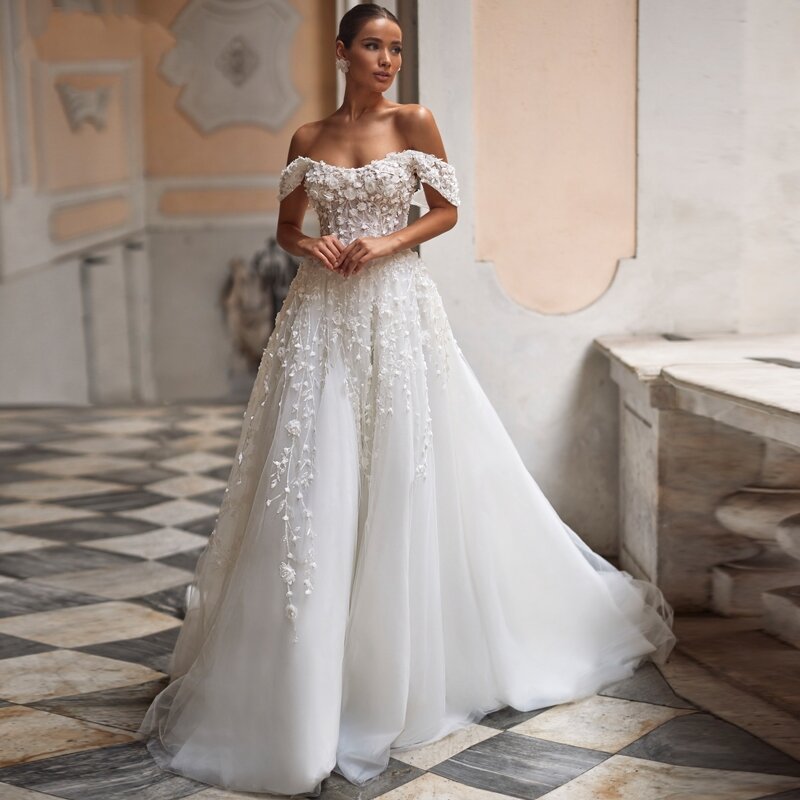 Eleganckie suknie ślubne tiulowe suknie ślubne o linii A koronkowe aplikacje z dekoltu na ramiona sięgają do podłogi Vintage Vestidos De Novia