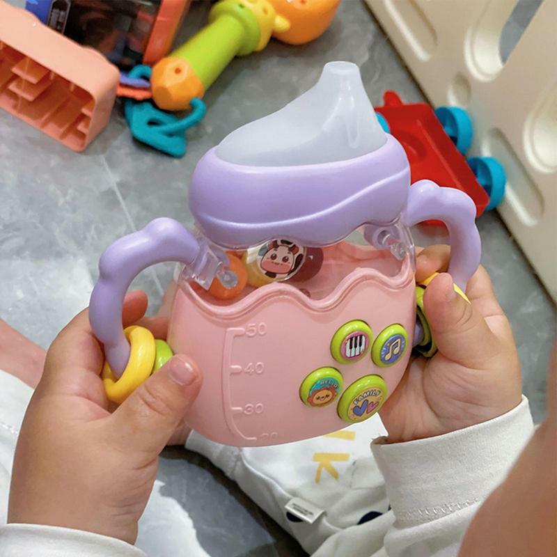 Rassel Beißring Spielzeug Neugeborene Spielzeug Rassel Beiß ringe Flasche glatt Neugeborenen greifen Rasseln Spielzeug pädagogisch und sicher für Mädchen und Jungen
