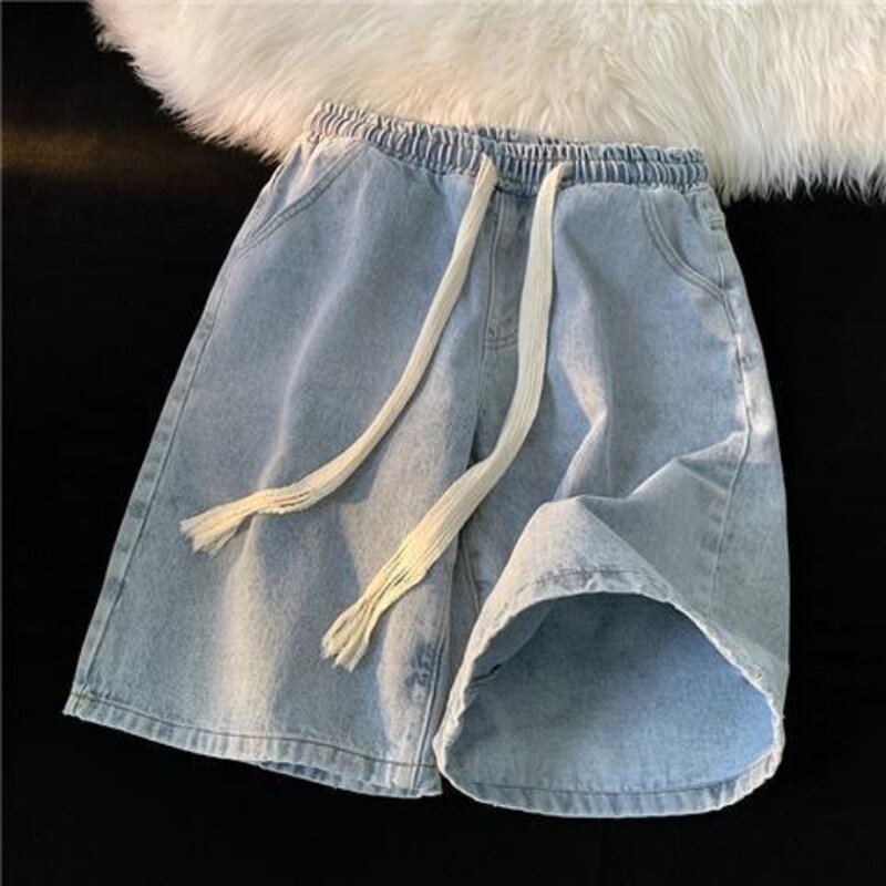 Letnie cienkie męskie spodenki jeansowe moda w pasie jasnoniebieskie krótkie dżinsy koreańskie Streetwear spodenki do kolan męskie