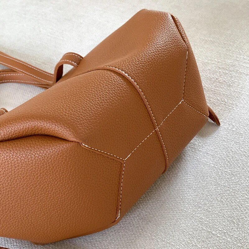 Inglaterra estilo sacolas para mulheres bolsas de designer de luxo e bolsas 2024 novo em pu lichia textura emenda decoração grande capacidade bolsa de ombro nas axilas alta qualidade
