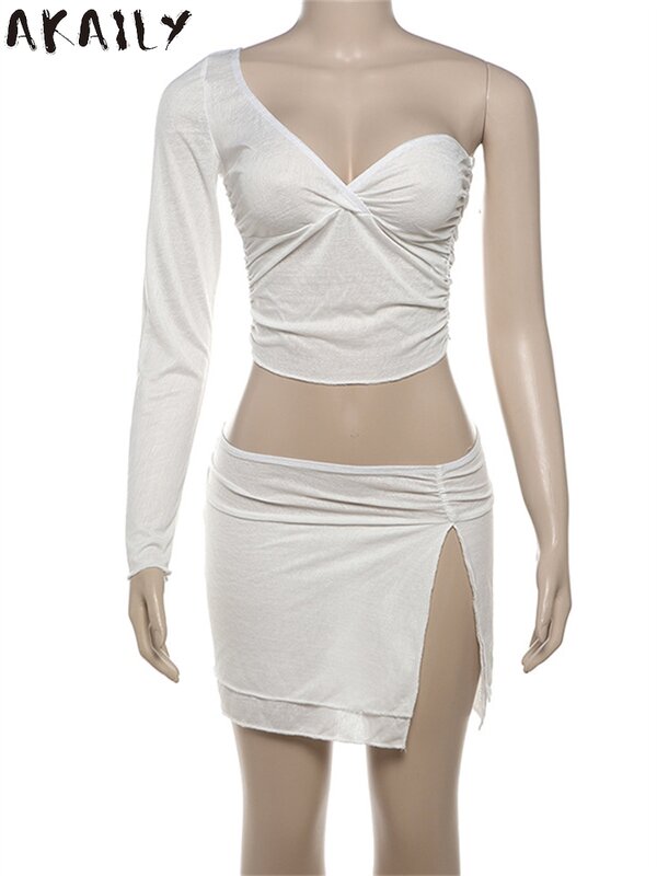 Akaily, весенний белый комплект из 2 предметов с рюшами, Клубная одежда для вечеринки для женщин 2024, короткий топ на одно плечо и мини-юбка с разрезом