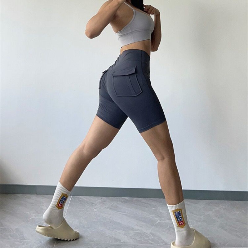 Celana pendek Fitness pantat persik wanita, celana tiga perempat latihan Yoga saku kering udara angkat ketat musim panas Q263