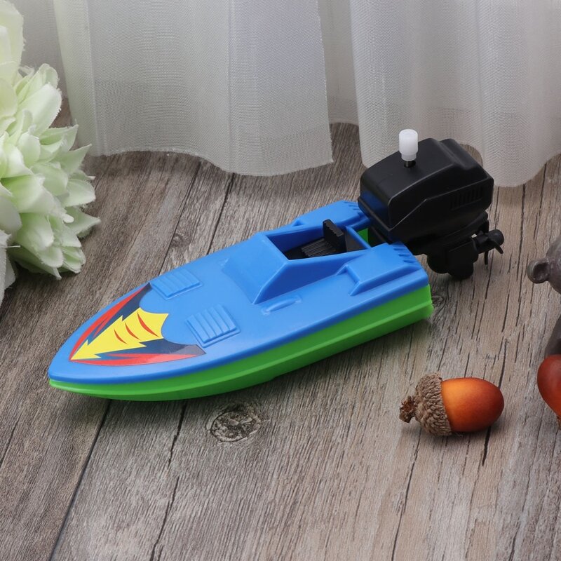 Interaktives Mini-Schnellboot-Poolspielzeug für den Wasserstrand zum Spielen der Cartoon-Babybadewanne