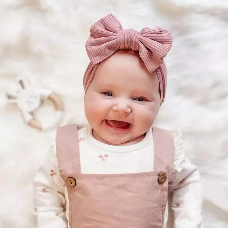 Fasce per bebè in maglia Color caramella fascia elastica per neonato con fiocco a coste fasce per neonato per bambina turbante per bambini accessori per bambini