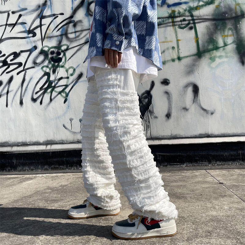 American Street Hip-hop Heavy Industry Jeans strappati da uomo 2023 primavera Straight Loose Vibe Style Skateboard pantaloni svasati bianchi