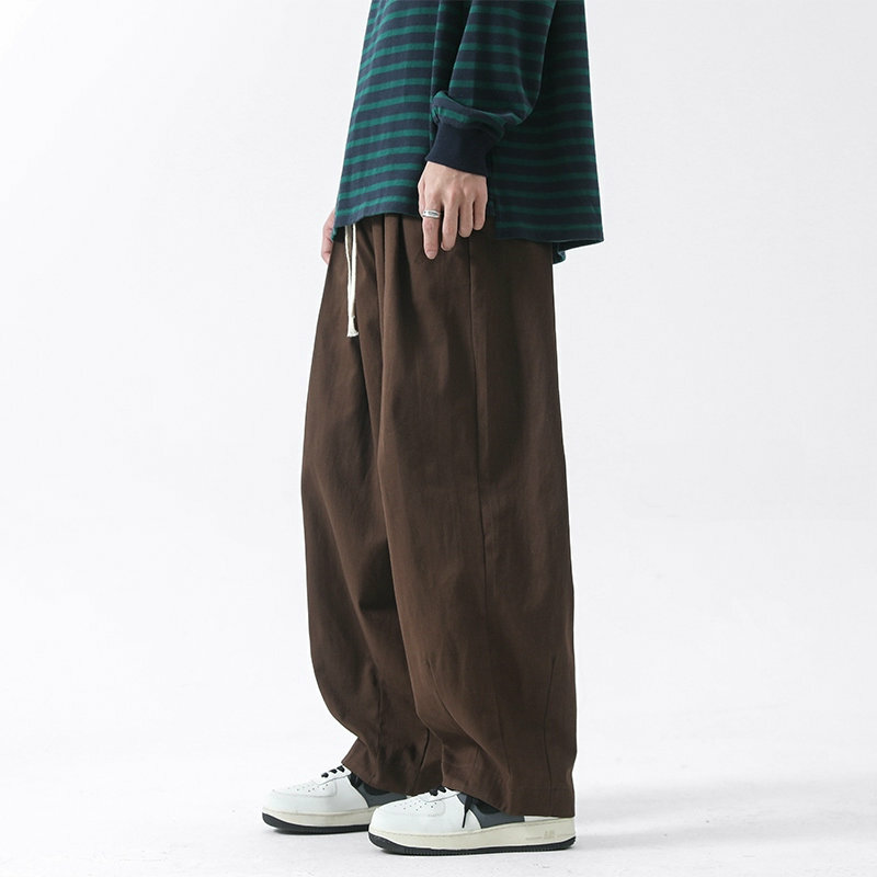 2024 męskie spodnie na co dzień z nogawkami Oversize z bawełny spodnie w jednolitym kolorze modne męskie spodnie do joggingu w koreańskim stylu moda uliczna w stylu Vintage 5XL