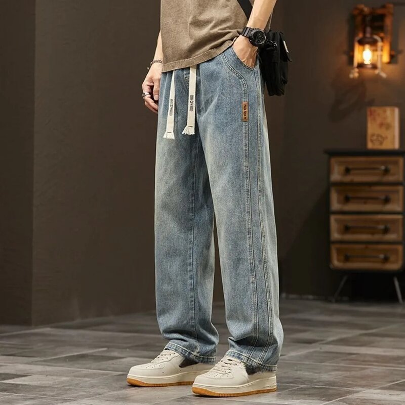 กางเกงยีนส์กางเกงยีนส์ขายาวสำหรับยีนส์ขากระบอกผู้ชายผ้ายืดทรงหลวมสไตล์เกาหลีแนวสปอร์ตแบบ2024New
