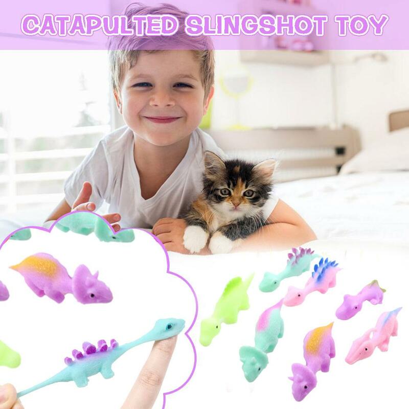 5Pcs Slingshot Dinosaur Finger Catapult Adult Kids Toys Funny Shoting Flying Sticky Games Party Favors Antistress Dinosaur Toy