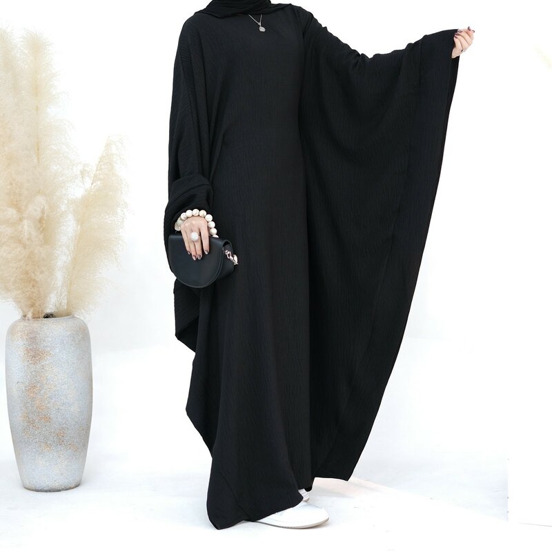 ชุดเดรสมุสลิมสำหรับผู้หญิงเสื้อคลุมแขนปีกค้างคาวคอกลมทรงหลวมสง่างาม