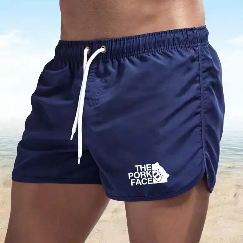 กางเกงขาสั้นชายหาดของผู้ชายกางเกงกีฬาขาสั้น Surf กางเกงวิ่งเซ็กซี่ชุดว่ายน้ำบอดี้สูทใหม่