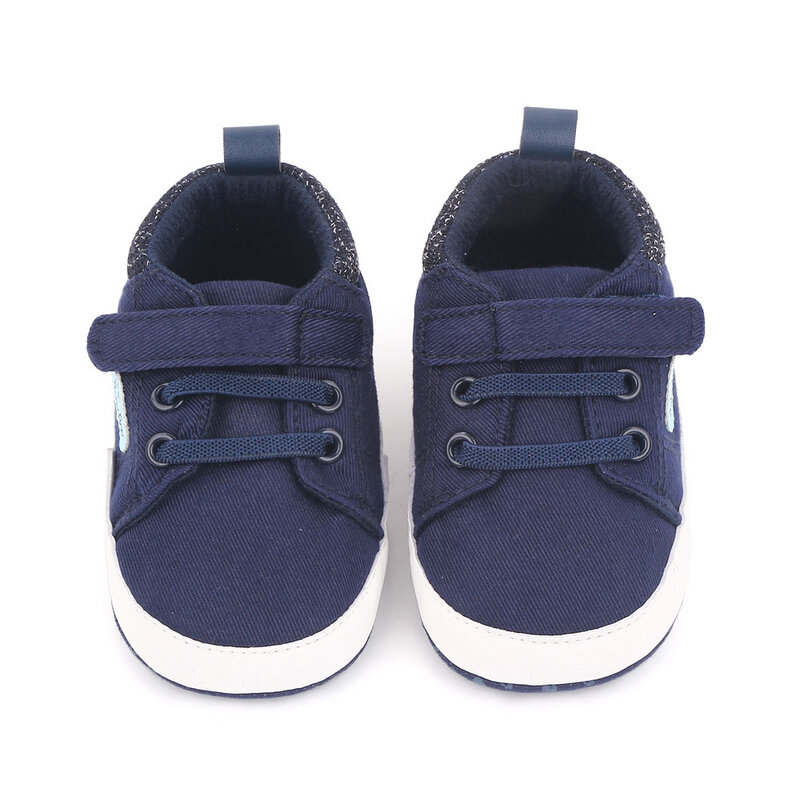 Sepatu tempat tidur bayi bermerek untuk bayi barang anak laki-laki langkah pertama latihan barang baru lahir Sneakers kanvas sol lunak balita hadiah pembaptisan