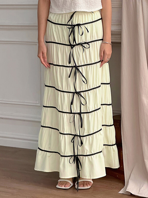 Rok Midi wanita lucu krem musim panas kontras pinggang elastis pita dekorasi rok A-Line pakaian mode jalanan