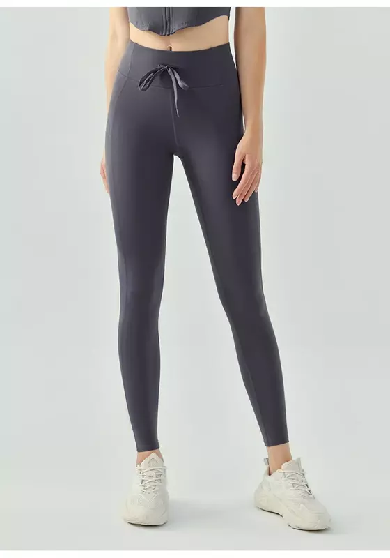 Spodnie sportowe do rysowania liny spodnie do fitnessu damskie bez kłopotliwych linii mają wysoką wytrzymałość, nagość i elastyczność.