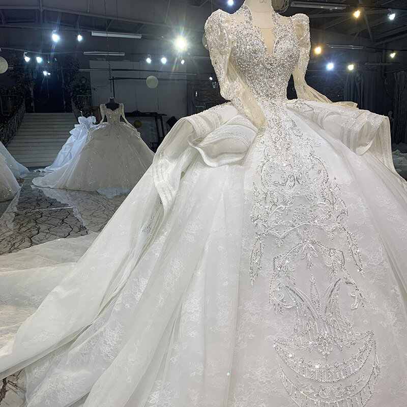 여성용 국제 프로모션 웨딩 드레스, 예배당 기차 구슬 프릴, 전체 소매 일루전 로브, 결혼 예배당 MN139