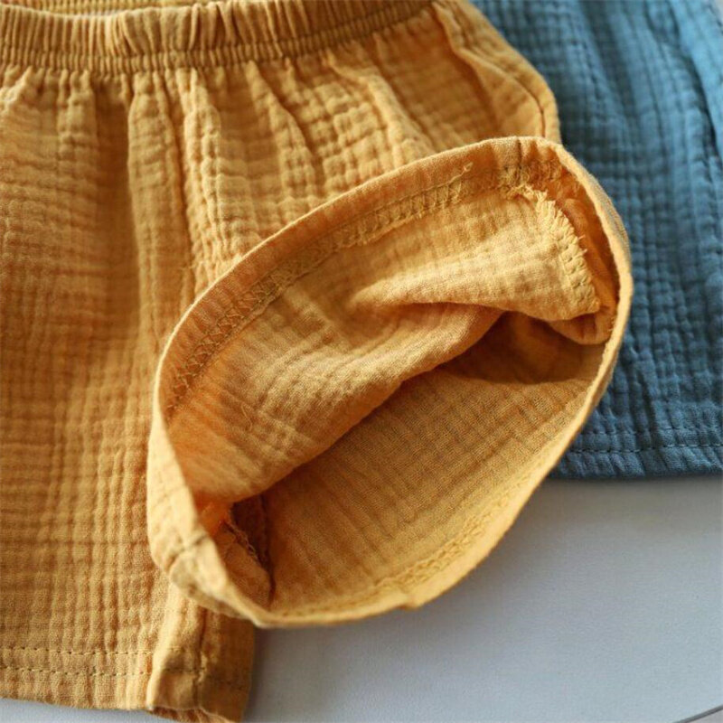 Short en coton et lin pour enfants, couleur unie, pantalon à cinq points pour garçons et filles, vêtements d'été pour bébés