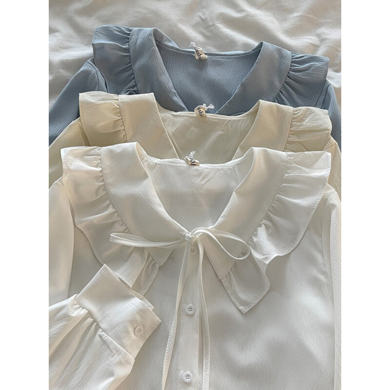 Camisas informales de estilo francés con volantes para mujer, cuello Peter Pan, manga larga, botonadura única, Color sólido, blusas elegantes para oficina