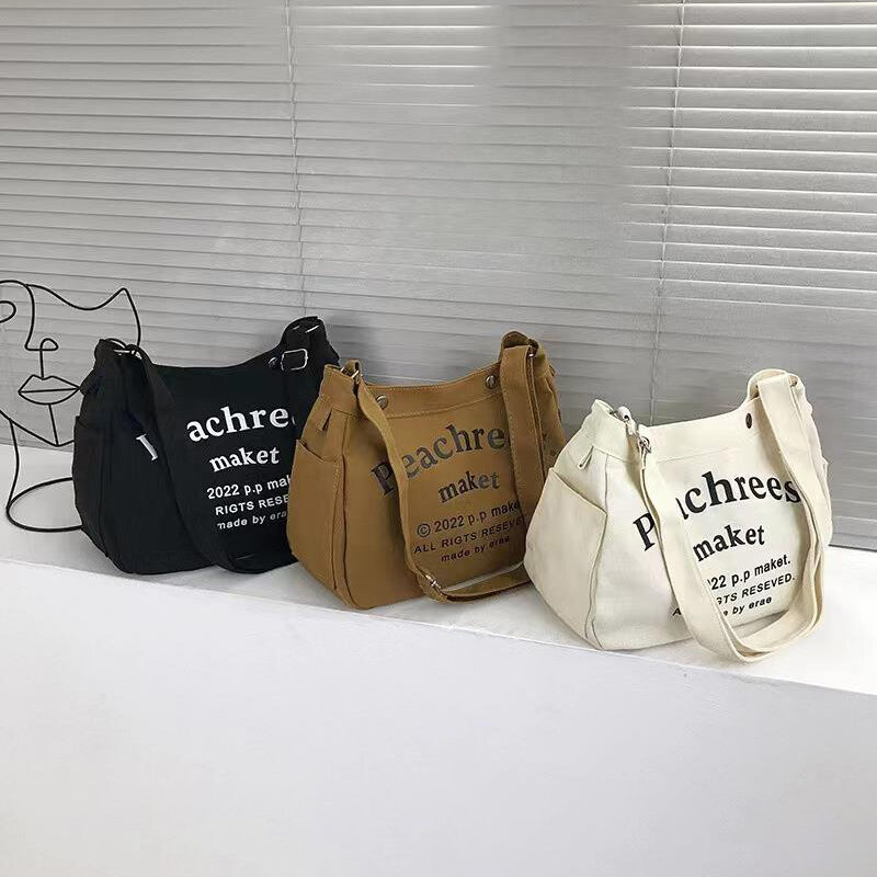 Mode Brief Muster Frauen Leinwand Umhängetasche lässig tragbare Damen Umhängetaschen große Kapazität Student Tote Handtasche