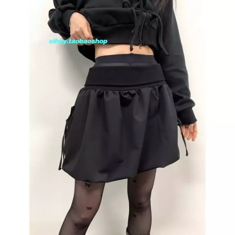 Frühling und Sommer Vintage koreanische Retro High Street niedrige Taille Schnürung Plissee Minirock Streetwear Mode Rock