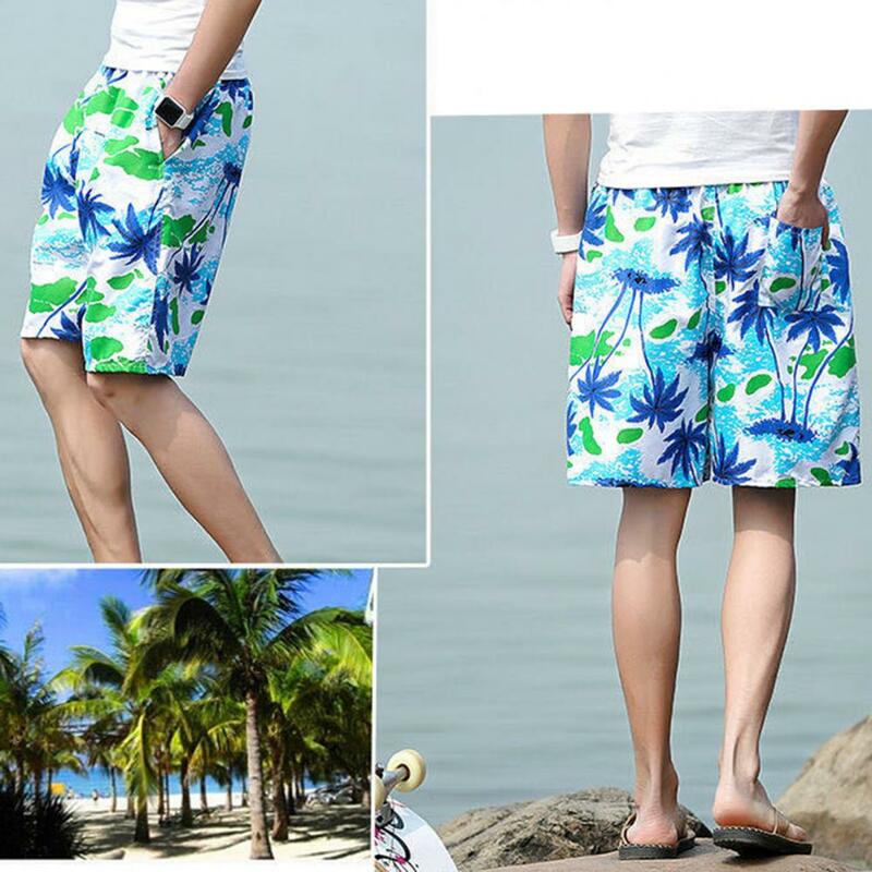 Celana pendek musim panas celana pendek tipis pakaian luar pohon tropis cetak pria musim panas celana pendek pantai cepat kering kaki lebar untuk Kasual