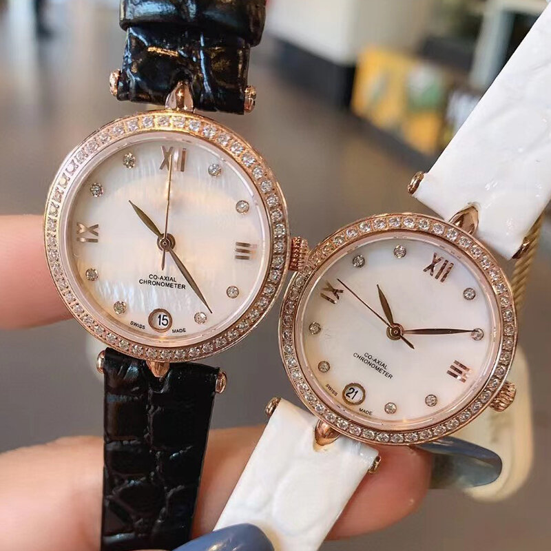 เคสเพชรดีไซเนอร์เพชรชุดหน้าปัดมุกสีฟ้านาฬิกาควอตซ์2024ใหม่ของผู้หญิงนาฬิกาแฟชั่นสุดหรู