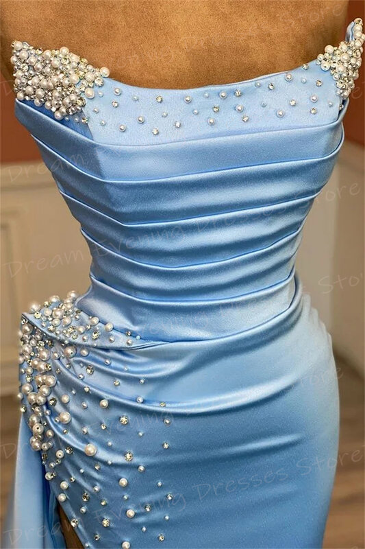 ชุดราตรีนางเงือกสีฟ้าสดใสสำหรับผู้หญิงชุดงานพรอมติดลูกปัดไข่มุกไม่มีสายคาดเซ็กซี่ผ่าข้างได้