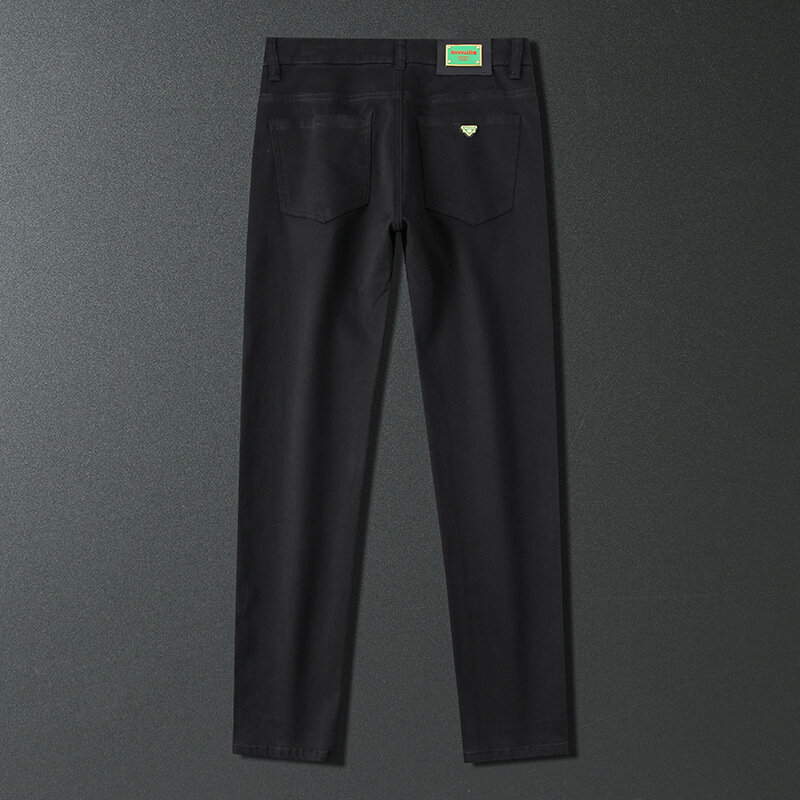 Jednokolorowe jeansowe męskie lato 2024new elastyczne obcisłe obcisłe modne spodnie typu casual na zakupy w biurze