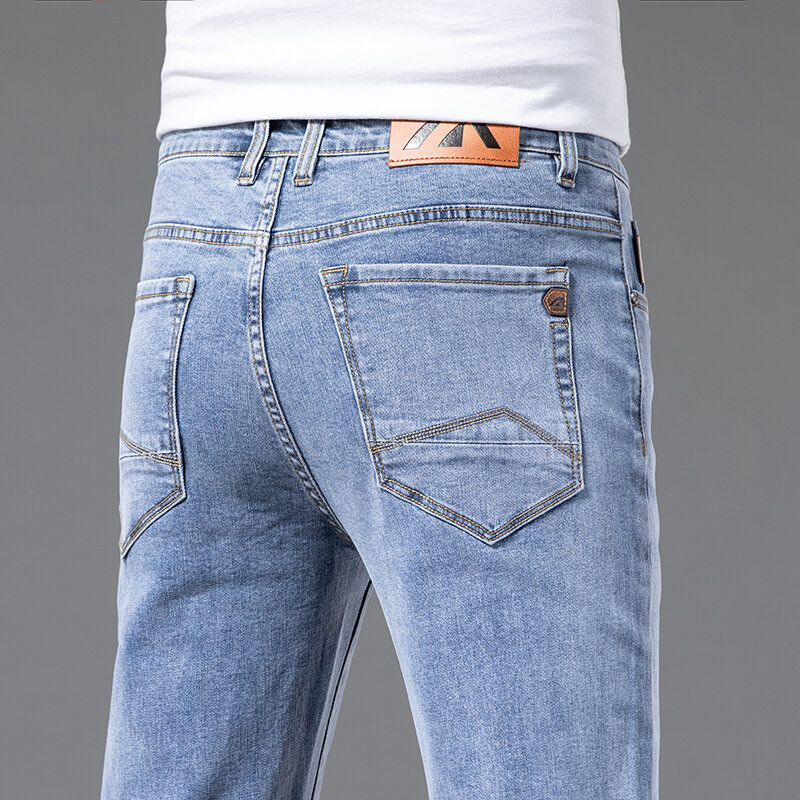 Celana Jeans Elastis Katun Tipis Lurus Fit Pria Baru Musim Panas Musim Gugur Celana Biru Muda Ringan Pria Saku Klasik