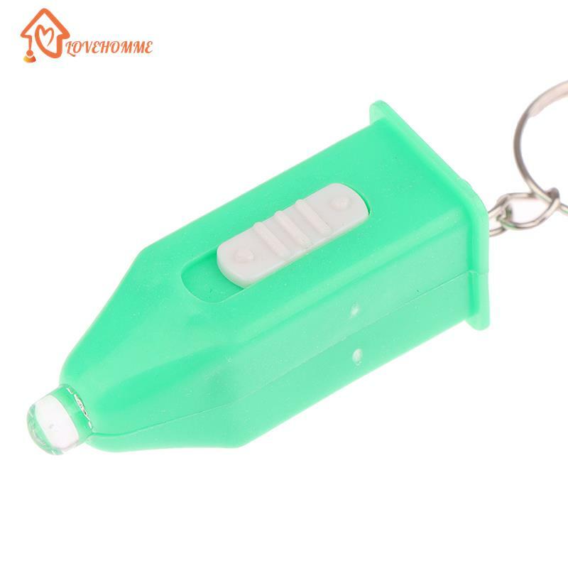 Innovativo e pratico LED Outdoor facile da trasportare portachiavi con luce viola Mini torcia in plastica ultravioletta regalo piccolo ciondolo