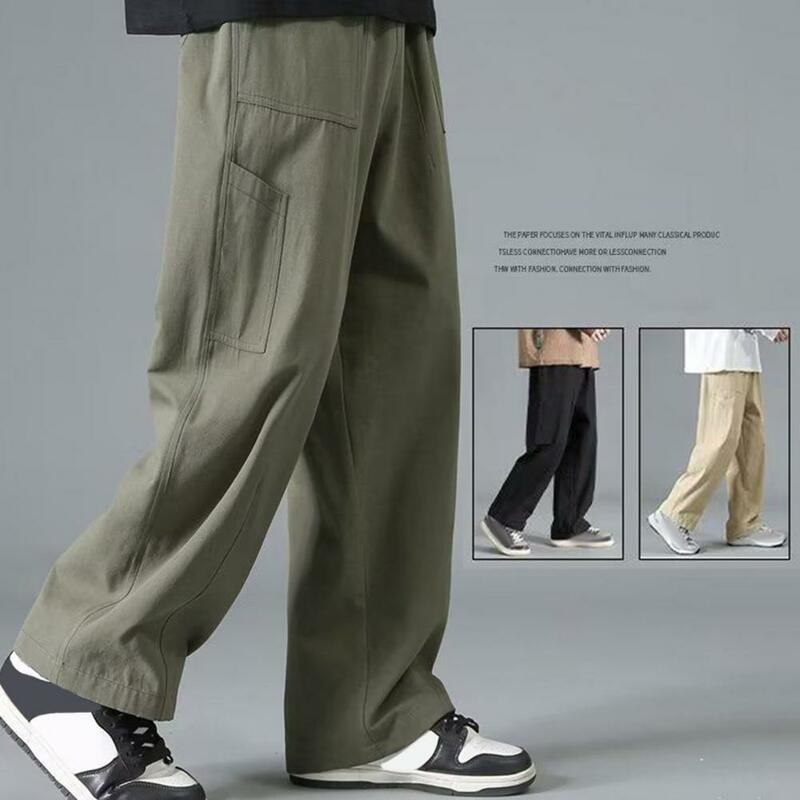 Monos de estilo japonés para hombre, pantalones de pierna ancha sueltos, Color sólido, cintura elástica, múltiples bolsillos, ropa de calle de longitud completa, uso diario