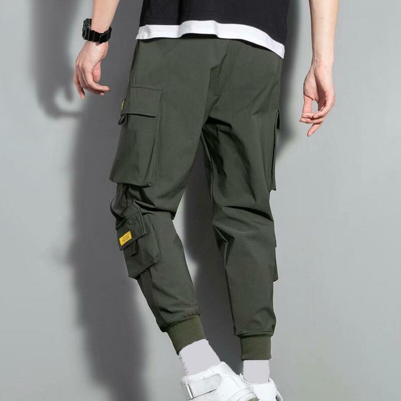 Pantalones Cargo multibolsillos con decoración de cinta para hombre, ropa de calle con cordón en la cintura, talla grande