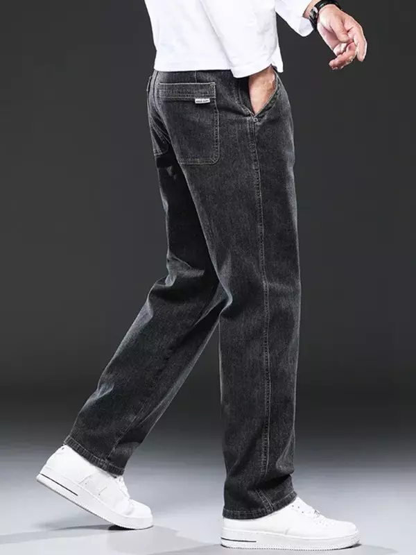 Jeans da uomo pantaloni elastici Plus Size pantaloni da Cowboy da uomo Casual dritti con tasche abbigliamento autunnale elasticizzato inverno Large Baggy