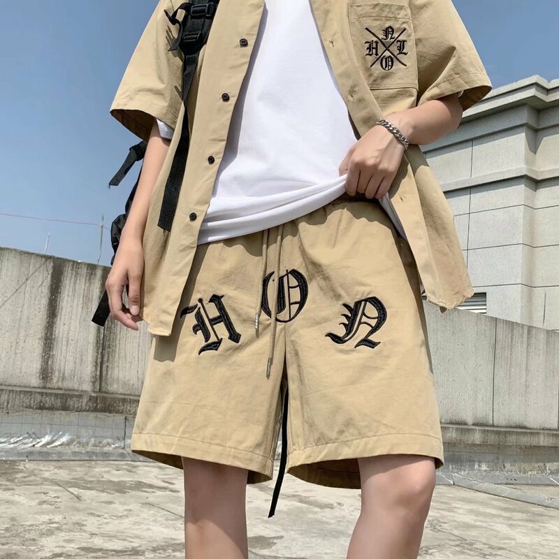 Conjunto de camisa de manga curta e shorts soltos com letra japonesa bordada para homens e mulheres, terno esportivo casual, moda retrô, verão, 2 peças