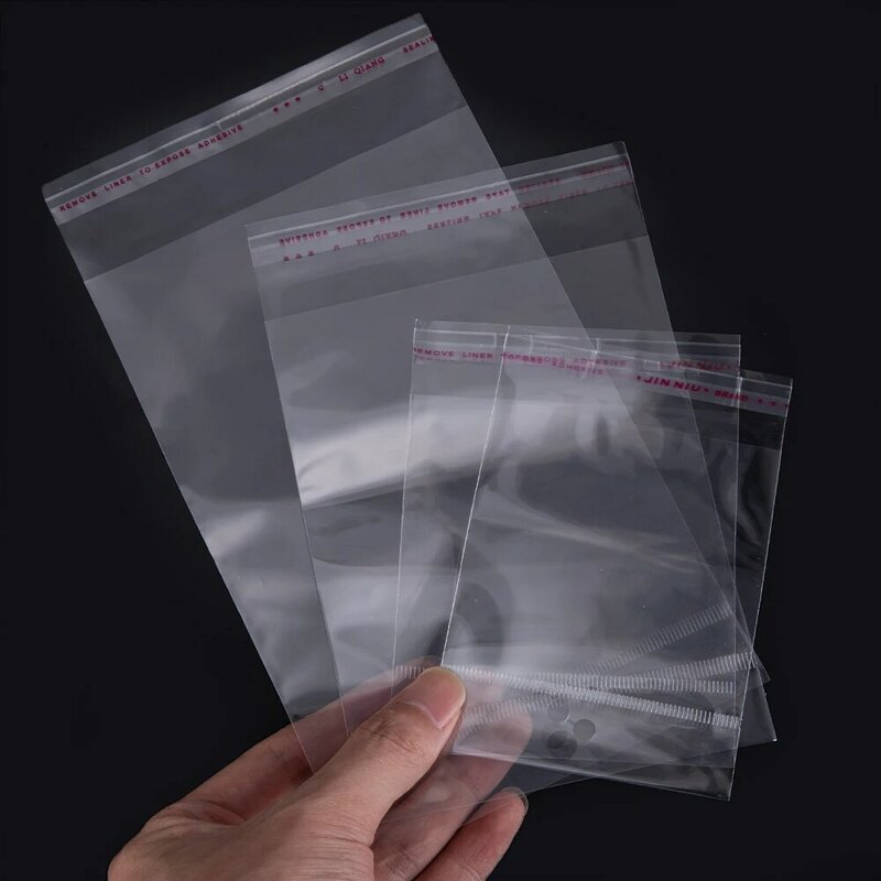 Bolsas transparentes de plástico con orificio para colgar, autosellantes de 50/100 piezas, para joyería, embalaje al por menor, dulces y galletas