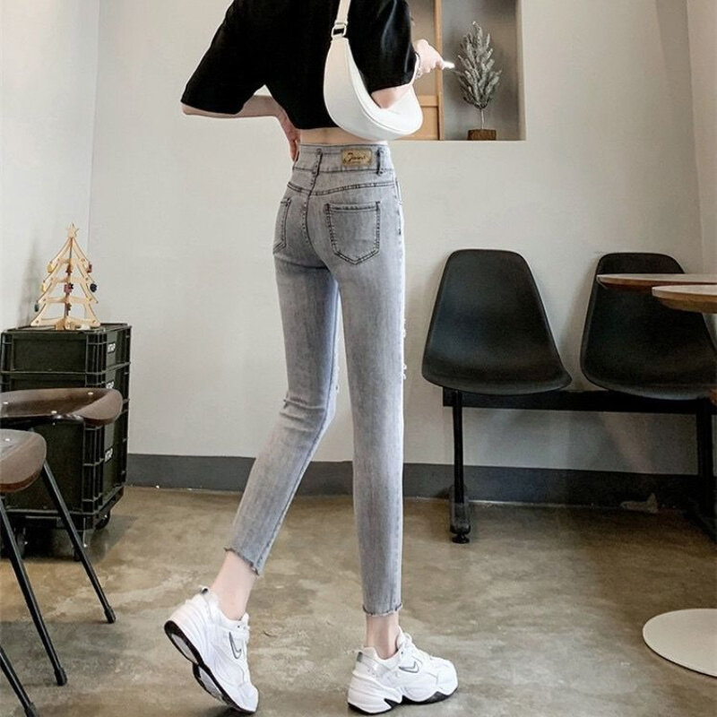 Celana panjang Jeans wanita, celana panjang Denim ramping pinggang tinggi lubang warna polos, celana pensil semata kaki musim panas