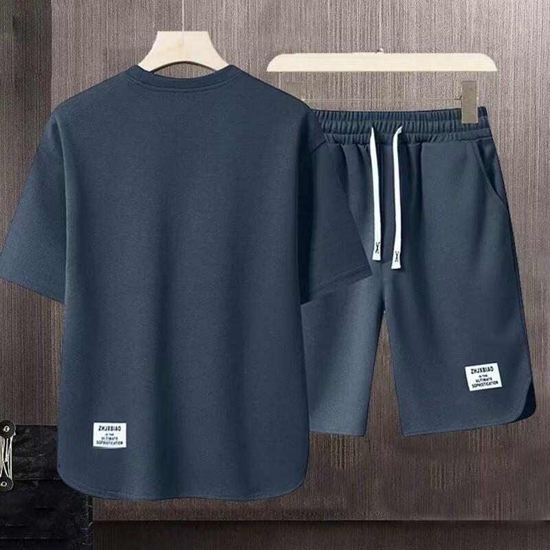 Conjunto de camiseta y pantalones cortos para hombre, traje informal de verano, camiseta de manga corta con cuello redondo, cintura elástica con cordón, pierna ancha, elegante