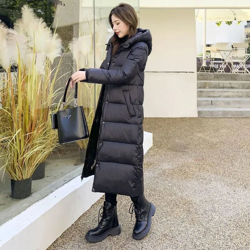 Abrigo con capucha a prueba de viento para mujer, Parkas de gran tamaño 4Xl, abrigo largo cálido coreano, chaqueta acolchada de Color sólido, invierno de nieve
