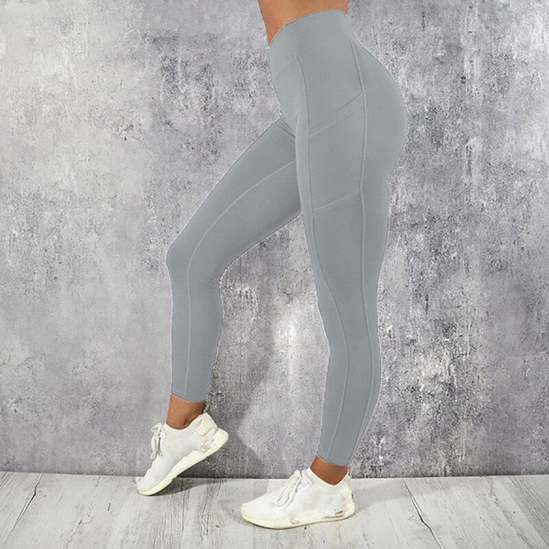Pantalones deportivos de alta elasticidad para mujer, pantalones de Yoga para correr, Fitness, bolsillos laterales para teléfono, moda de Color sólido, 2023