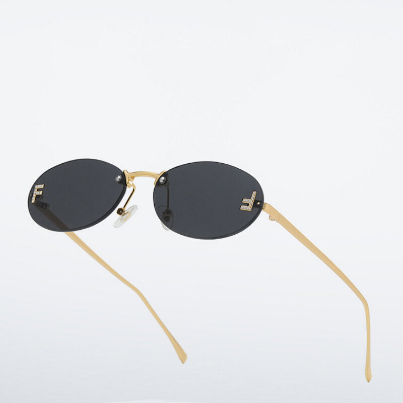 Punk okulary przeciwsłoneczne Cat Eye damskie okulary przeciwsłoneczne bez oprawek do jazdy okulary Retro litery owalne okulary przeciwsłoneczne Oculos De Sol