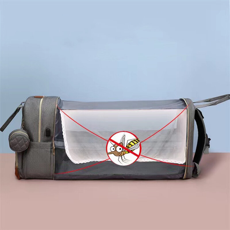 กระเป๋าเป้สะพายหลังผ้าอ้อมเด็กแบบพับได้เตียงกันน้ำ USB ชาร์จกระเป๋าผ้าอ้อมกระเป๋าเป้สะพายหลังเปลี่ยนเตียง