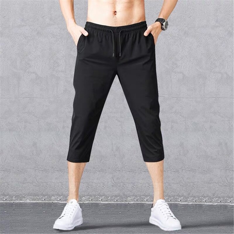 Calções casuais de secagem rápida para homem cintura elástica calções esportivos abaixo do joelho calças curtas