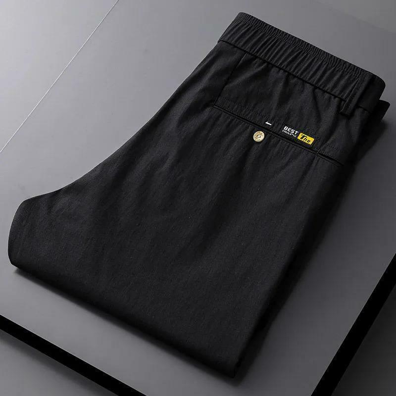 Новинка лета 2024, мужские эластичные модные однотонные удобные облегающие универсальные повседневные брюки с карманами и кулиской в стиле пэчворк