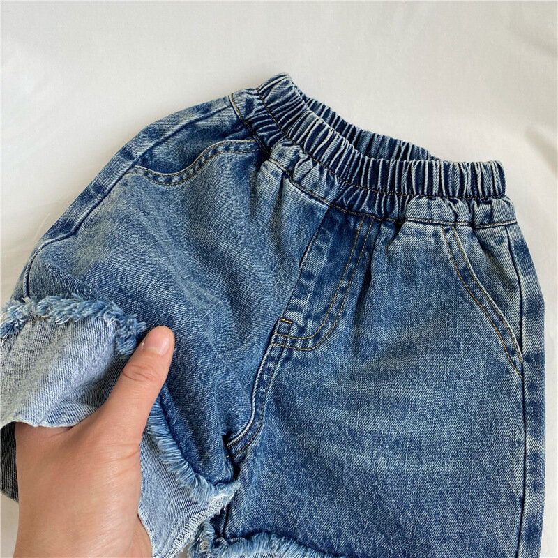 Versione coreana estate bambini vintage vecchi pantaloncini di jeans uomo e donna tesoro bordo grezzo denim 5 punti pantaloni medi 80-130cm