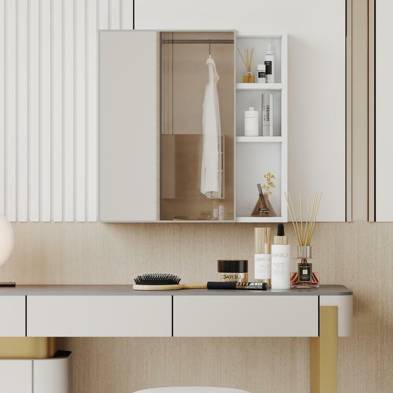 Une armoire à miroir en matériau NW blanc, un miroir de salle de bain et un miroir de salle de bain mural séparé pour le stockage et le gain de place.